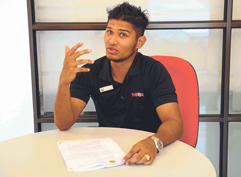 Jeremy Matthew Danker talking about his plight at the Malay Mail office recently. He hopes Sabah FA will keep their end of the bargain. — Picture by Ahmad Zamzahuri