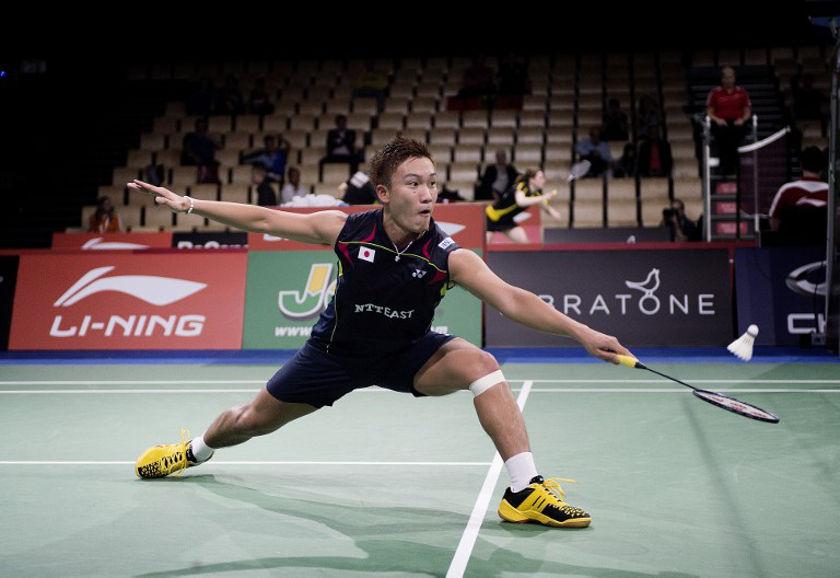 Japan's Kento Momota plays against Wei Nan (not pictured) of Hong Kong at the 2014 BWF Badminton World championships held at the Ballerup Super Arena in Copenhagen on August 25, 2014. u00e2u20acu201d AFP pic