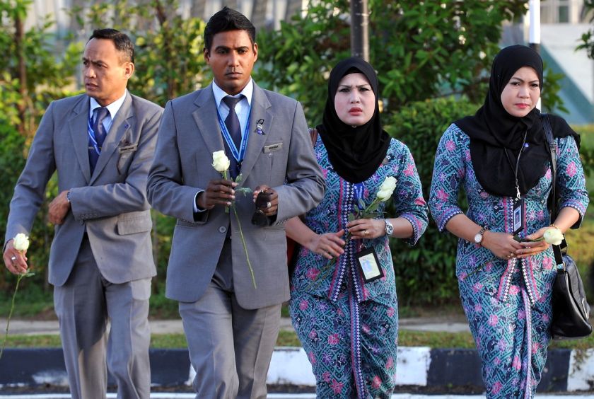 Malaysia Airline crew arrive at Bunga Raya Complex for the MH17 mourning ceremony in KLIA, August 24, 2014. u00e2u20acu201d Bernama pic