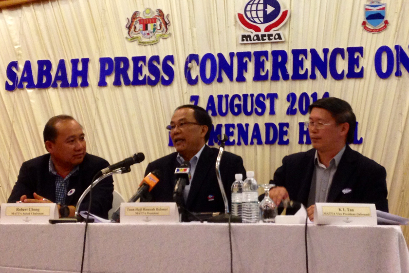 (From left) Matta Sabah Chapter Chairman Robert Chong, Matta President Hamzah Rahmat and Vice President K.L.Tan at a press conference on August 7, 2014. u00e2u20acu201d Picture by Julia Chan