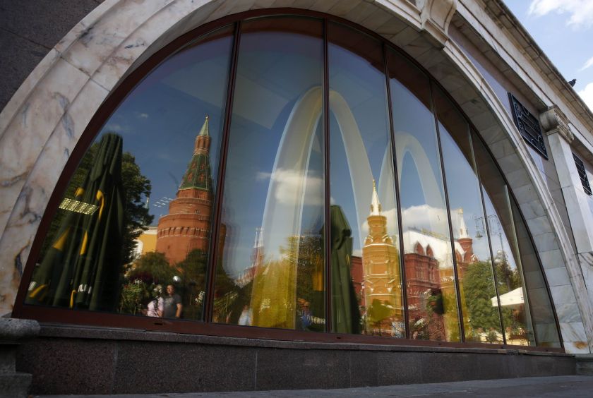 The walls and towers of the Kremlin are reflected in a window of a closed McDonald's restaurant, one of four temporarily closed by the state food safety watchdog, in Moscow, August 21, 2014. u00e2u20acu2022 Reuters pic