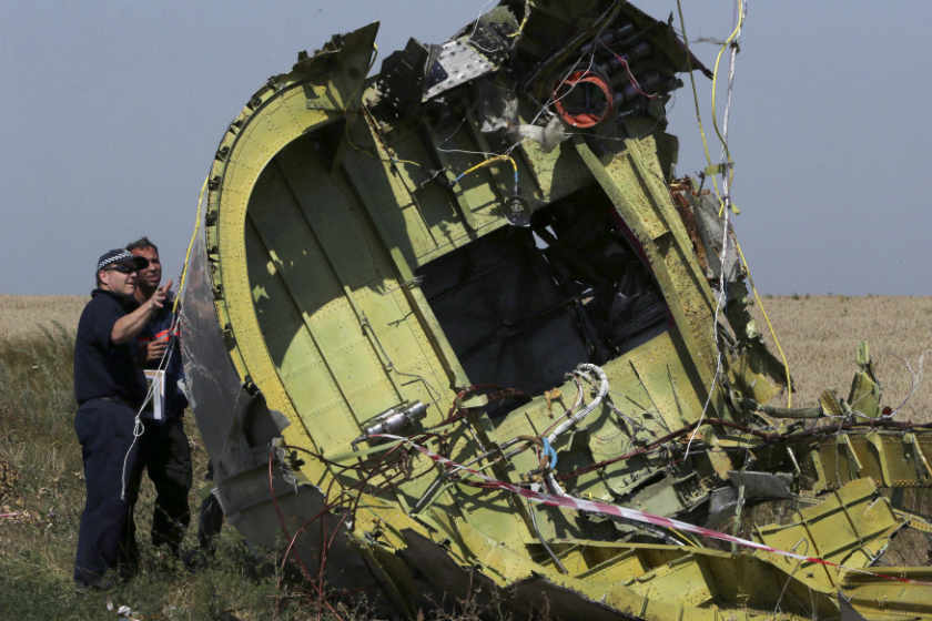 Members of a group of international experts inspect the territory at the site where the downed Malaysia Airlines flight MH17 crashed, near the village of Hrabove. u00e2u20acu201d Reuters pic