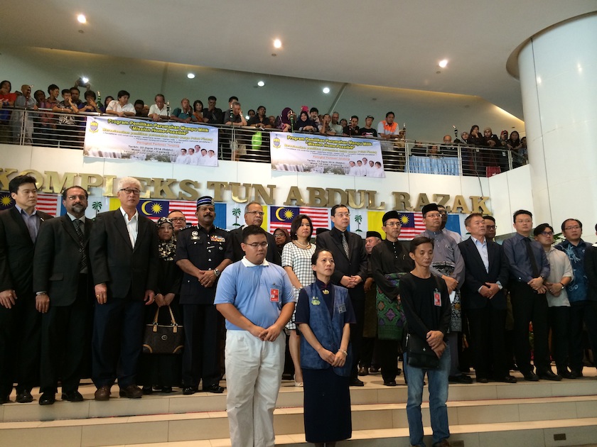(Front, from left) Yeoh Hock Pheng, Loh Ean Tin and Loh Kok Wah. They are relatives of Tan Siew Poh, Loh Yan Hwa and Fan Shun Po who all perished on MH17. u00e2u20acu201du00c2u00a0Picture by Opalyn Mok.n
