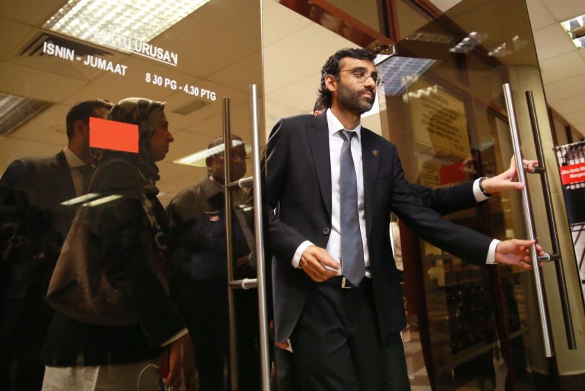 PKR vice-president N. Surendran exits from the Sessions Court at Jalan Duta Court Complex in Kuala Lumpur, August 19, 2014. u00e2u20acu2022 Picture by Saw Siow Feng