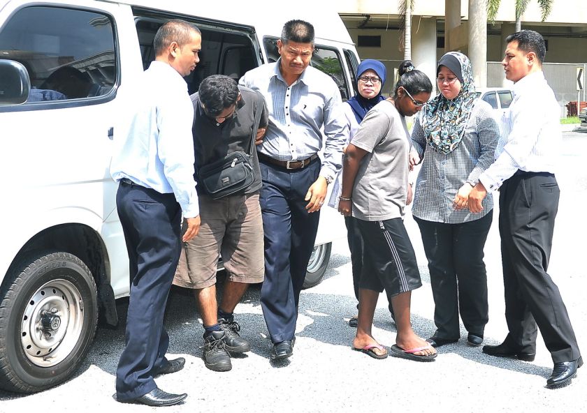 HSBC bank officer Nur Shila Kanan and her husband Basheer Ahmad Maula Sahul Hameed were charged with transferring and withdrawing money from the accounts of four victims of the missing Malaysia Airlines flight MH370. u00e2u20acu201d Bernama pic