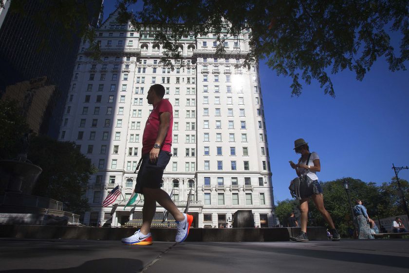 People walk past the Plaza Hotel in the Manhattan borough of New York City, August 18, 2014. u00e2u20acu201d Reuters pic