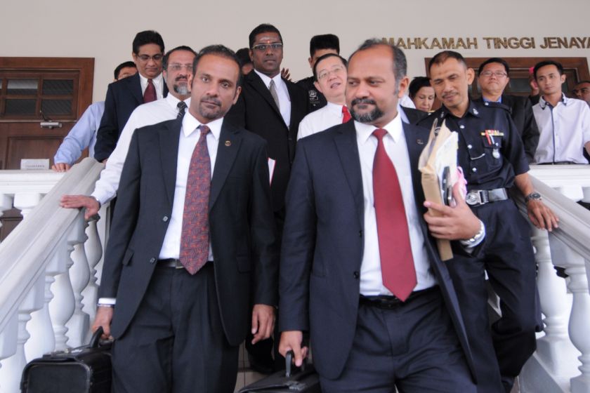 Seri Delima assemblyman RSN Rayer leaving the court house together with his counsel Ramkarpal Singh (left) and Gobind Singh Deo (right) on August 27, 2014. u00e2u20acu2022 Picture by K.E. Ooi