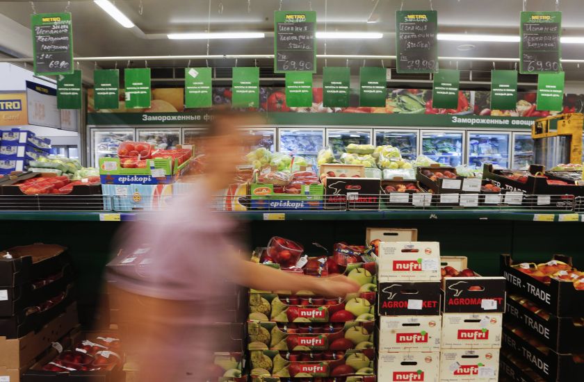 A customer walks past boxes with fruit at a Metro Cash and Carry store in Moscow August 8, 2014. u00e2u20acu2022 Reuters pic 