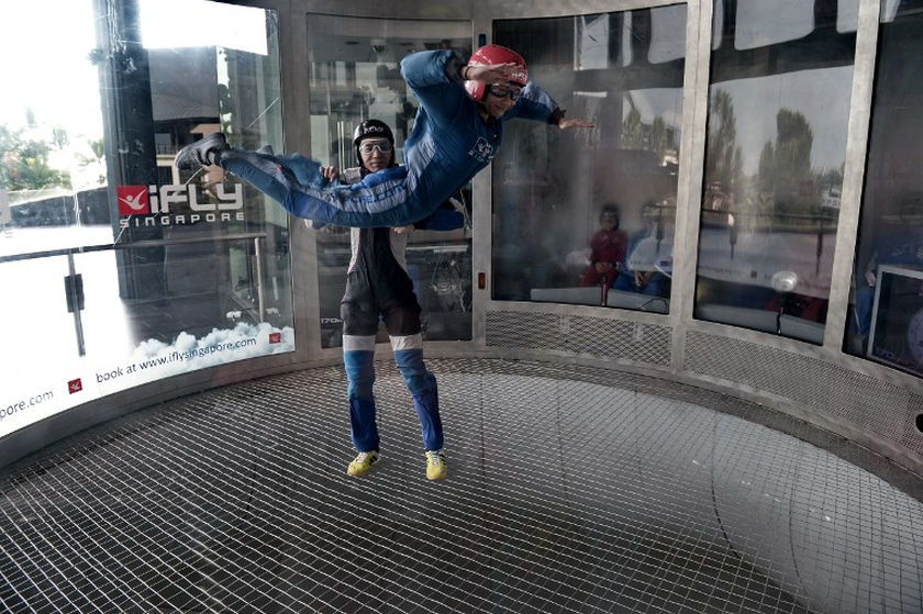 This file photo shows visitor try out an indoor skydiving facility, iFly on Sentosa island. u00e2u20acu2022 AFP picn