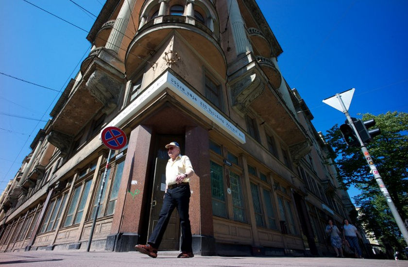 A man walks past the 'Stura maja,' former headquarters of the Soviet KGB in Riga, Latvia on July 9, 2014. u00e2u20acu201d AFP pic