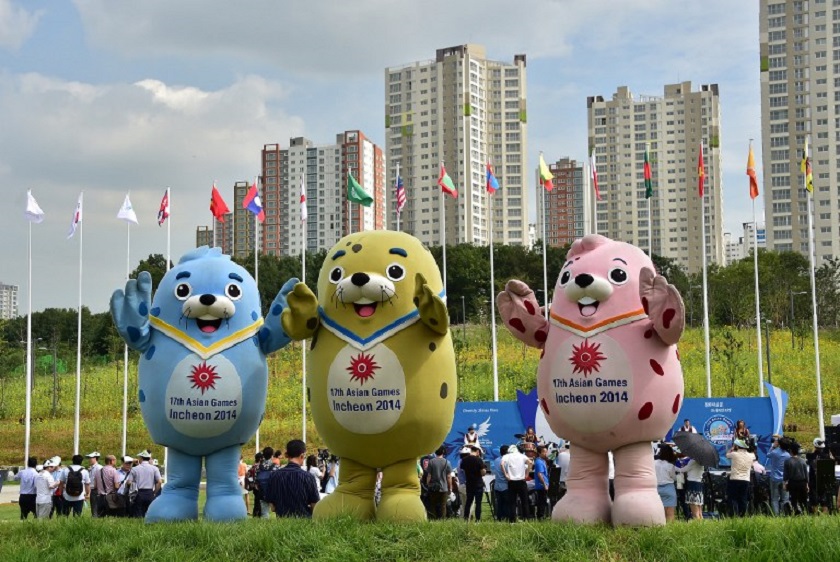 Asian Games mascots Barame (left), Vichuon (centre) and Chumuro (right) posing on the flag plaza of the Athletesu00e2u20acu2122 Village ahead of the upcoming 2014 Asian Games during a media tour in Incheon, August 26, 2014. u00e2u20acu201d AFP pic 