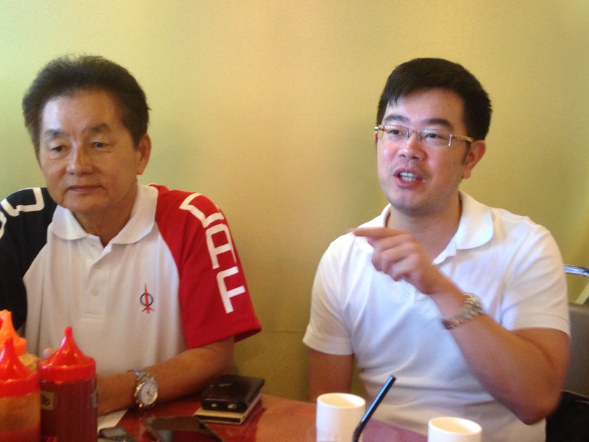 Junz Wong (right), the first representative to be suspended in the Sabah State Assembly said the suspension period was not provided for in the law. u00e2u20acu201d Picture by Julia Chan
