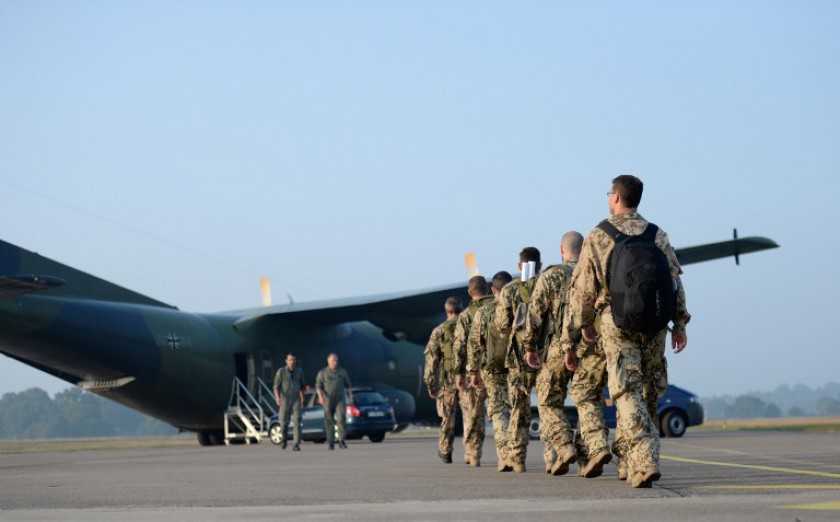 Soldiers walk towards a Transall aircraft at the Nato airport in Hohn, northern Germany, on September 19, 2014. The German government had decided to provide weapons and ammunitions to Kurdish Peshmerga.  u00e2u20acu201d AFP pic