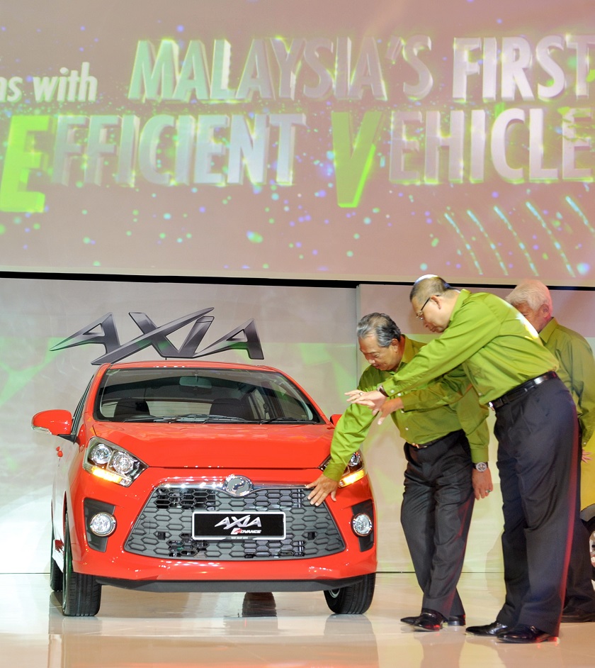 Deputy Prime Minister Tan Sri Muhyiddin Yassin at the launch of the Perodua Axia at the Kuala Lumpur Convention Centre in Kuala Lumpur, September 15, 2014. — Bernama pic