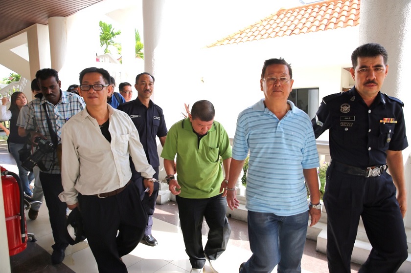 (From left) Ong Eu Soon, Lee Chan Kwong and Lee Yew Kuen were all charged with fighting in a public place at the magistrateu00e2u20acu2122s court here, September 10, 2014. u00e2u20acu201d Picture by K.E. Ooinnn