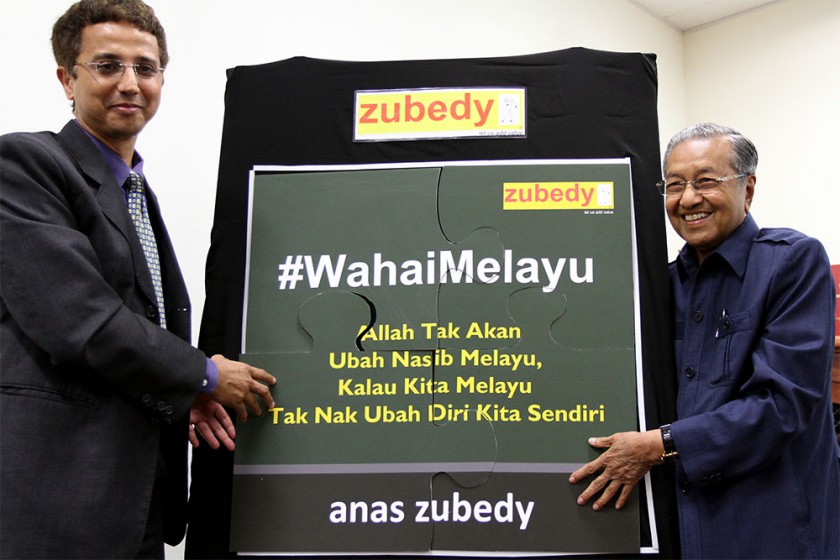 Former Prime Minister Tun Dr Mahathir Muhammad (right) and Anas Zubedy  at the launching of the latteru00e2u20acu2122s book at the Oval Tower in Damansara, September 11, 2014. u00e2u20acu201d Picture by Yusof Mat Isa