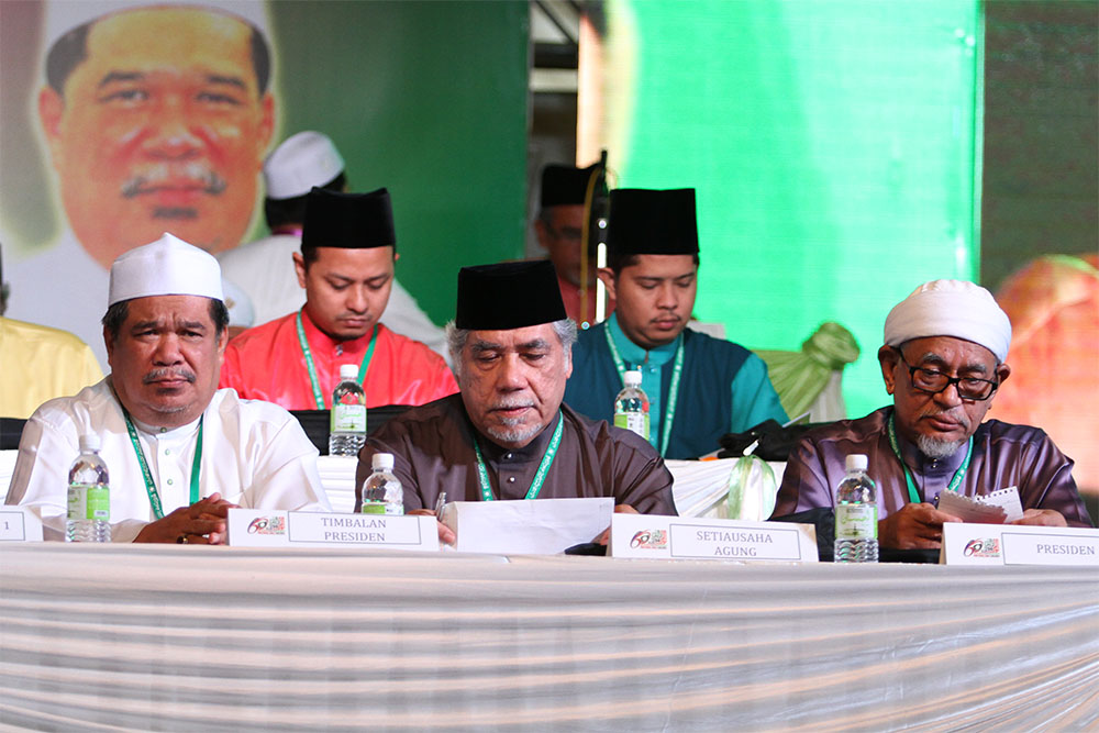 (From left) PAS Deputy President Mohamad Sabu, PAS secretary-general Datuk Mustafa Ali and PAS president Datuk Seri Abdul Hadi Awang at the PAS 60th Muktamar in Batu Pahat, September 18, 2014. u00e2u20acu2022 Picture by Yusof Mat Isa