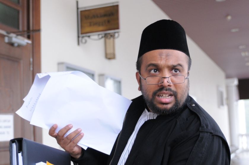 Controversial former Bukit Gelugor candidate, Abu Backer Sidek, is charged with intentional insult over racial remarks he allegedly made ahead of the Bukit Gelugor by-election in May, September 9, 2014. u00e2u20acu2022 Picture by K.E. Ooi