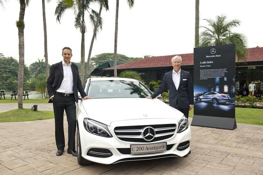 Kai Schlickum (left), vice-president, Mercedes-Benz Malaysia with president and CEO Roland Folger with the new Mercedes-Benz C 200 AVANTGARDE at the launch. u00e2u20acu201d pictures courtesy of Mercedes Benz