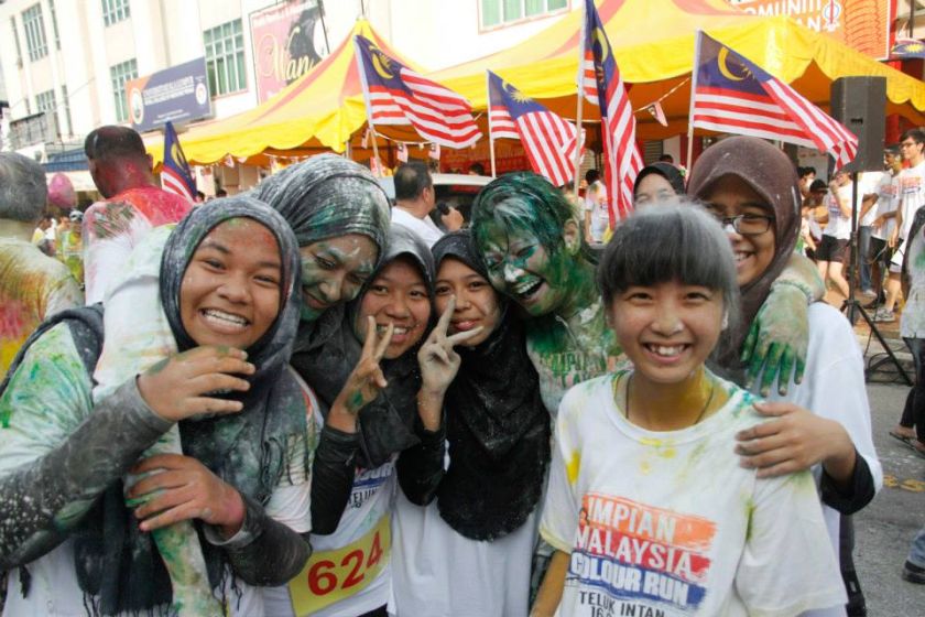 The colourful participants of the Impian Malaysia Colour Run. u00e2u20acu2022 Picture by Dyana Sofya