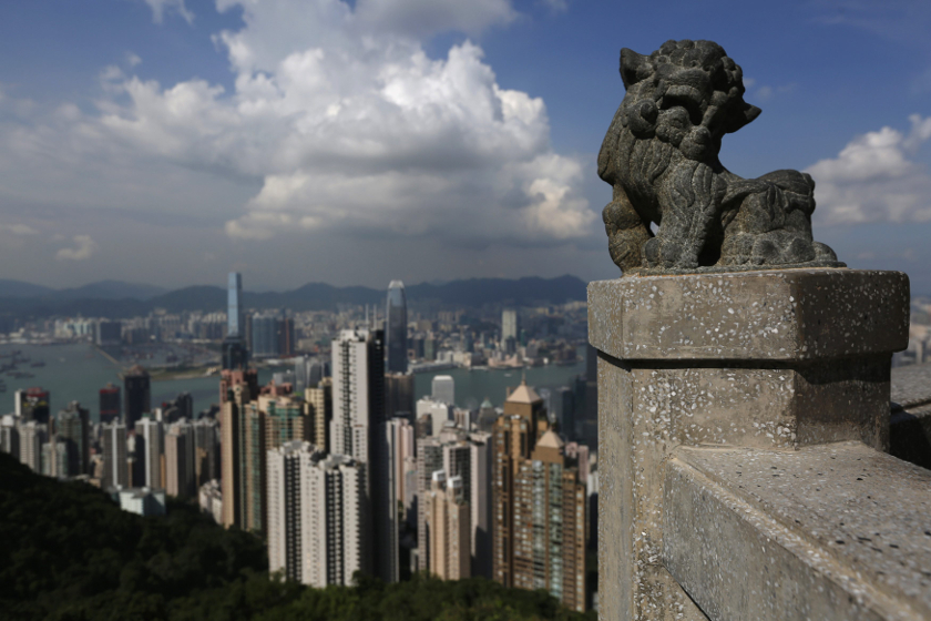 The skyline of Hong Kong is seen from a Chinese-style pavilion at the Peak in Hong Kong September 10, 2014. u00e2u20acu201d Reuters pic