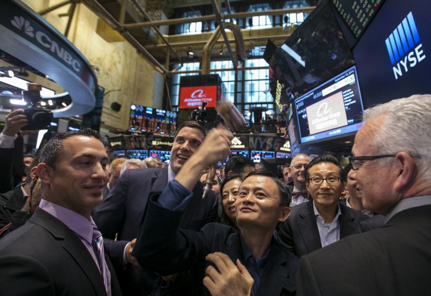 Alibaba Group Holding Ltd founder Jack Ma (centre) jokes around with a gavel during his company's initial public offering (IPO) under the ticker u00e2u20acu02dcBABAu00e2u20acu2122, at the New York Stock Exchange in New York September 19, 2014. u00e2u20acu2022 Reuters pic