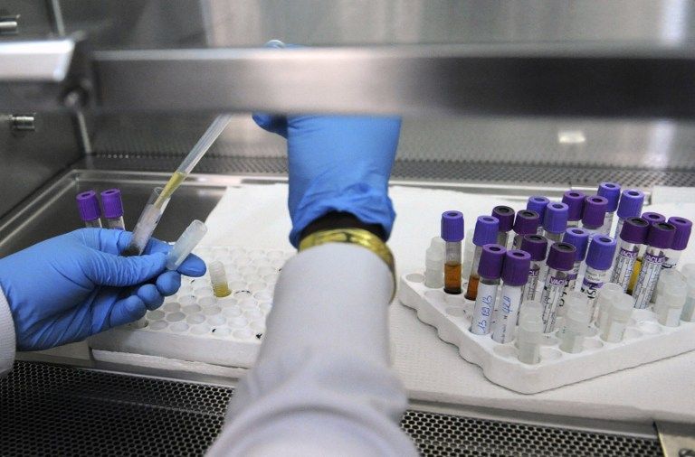 A view of blood samples of people living with HIV in a laboratory at the AIDS Research Center of the Treichville hospital in Abidjan on September 13, 2013 u00e2u20acu201d APF pic