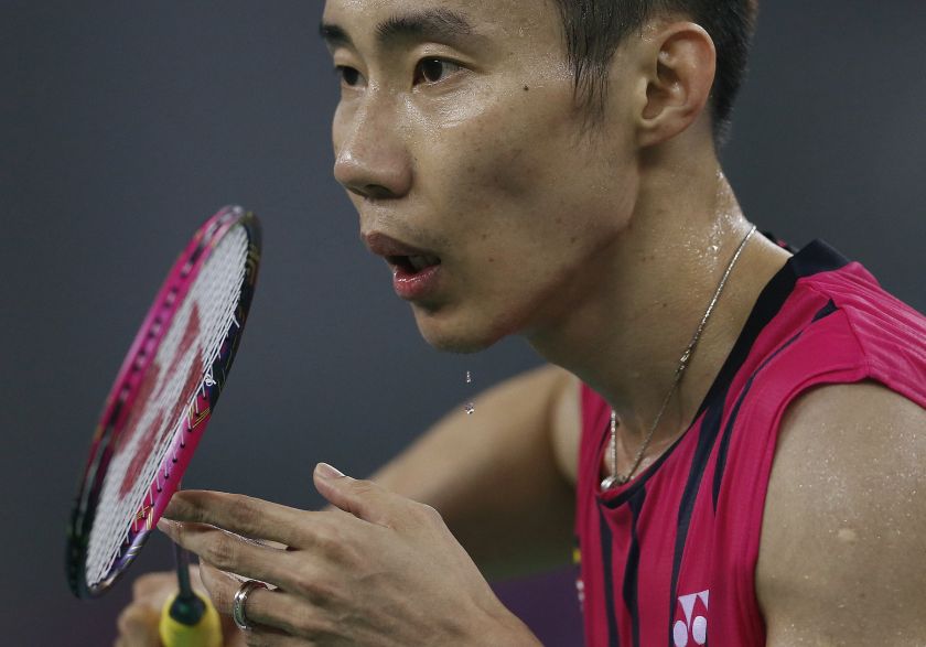 Lee Chong Wei sweats as he waits to return a serve against Vietnam during the men's singles quarter final badminton match at Gyeyang Gymnasium, at the 17th Asian Games in Incheon September 27, 2014.  u00e2u20acu201d Reuters pic
