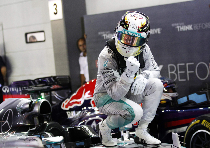 Mercedes Formula One driver Lewis Hamilton of Britain gestures after winning the Singapore F1 Grand Prix at the Marina Bay street circuit in Singapore September 21, 2014. u00e2u20acu201d Reuters pic