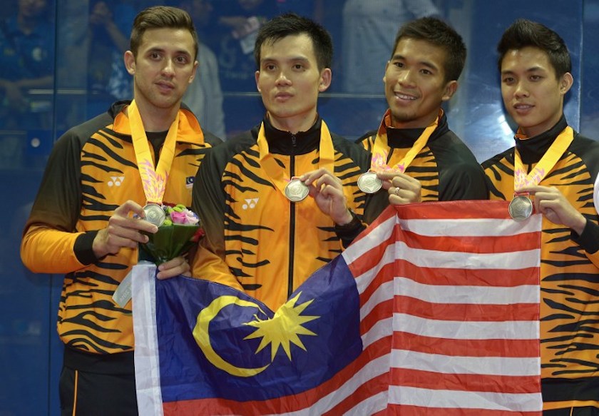 Silver medalists from Malaysia pose during the medal ceremony for the menu00e2u20acu2122s squash team final round at the 2014 Asian Games in Incheon September 27, 2014.  u00e2u20acu201d AFP pic