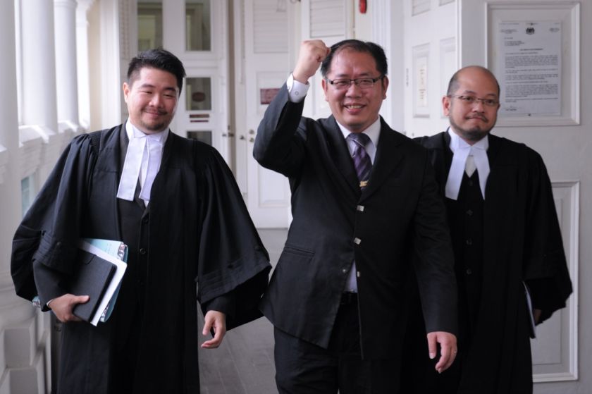The High Court ruled that it is not defamatory for Ng Wei Aik to use the term u00e2u20acu02dcfrogu00e2u20acu2122 against Lim Boo Chang, dismissing the defamation suit by Lim against him and awarded Ng with RM30,000 in costs. With Ng are Lee Khai (right) and Tham Shien Shyong, Se