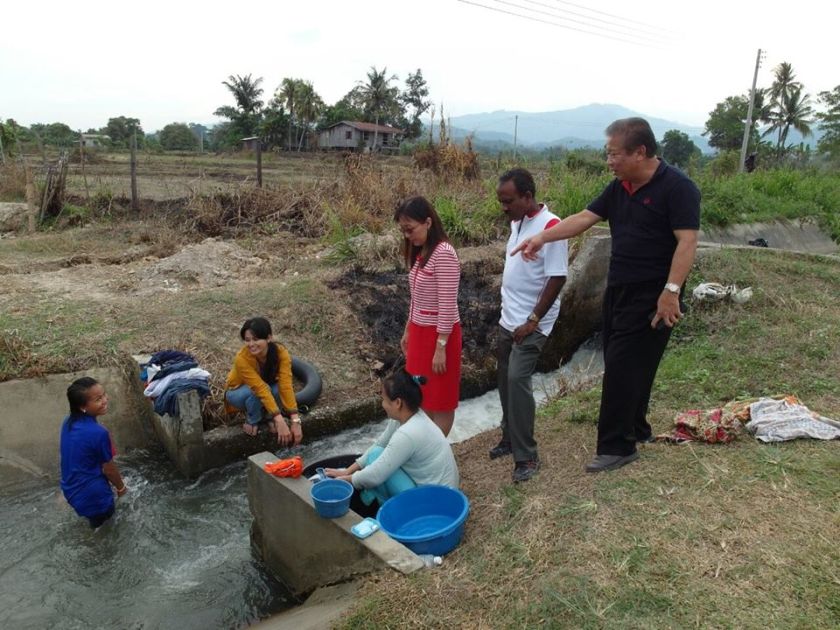 In many villages in Sabah, they have to resort to using water from irrigation canals. ― Picture by Dyana Sofya