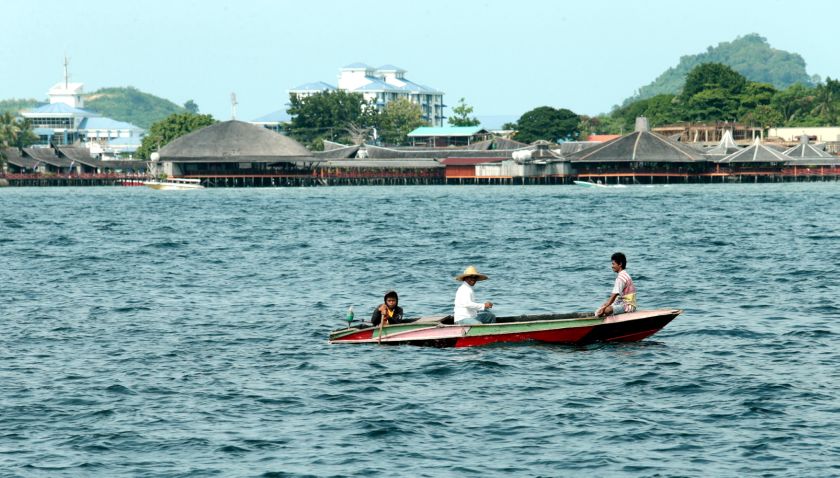 Smalltime fishermen in Semporna feel the pinch due to the dusk to dawn curfew imposed since July 19 to curb kidnappings. u00e2u20acu201d Picture by Julia Chan