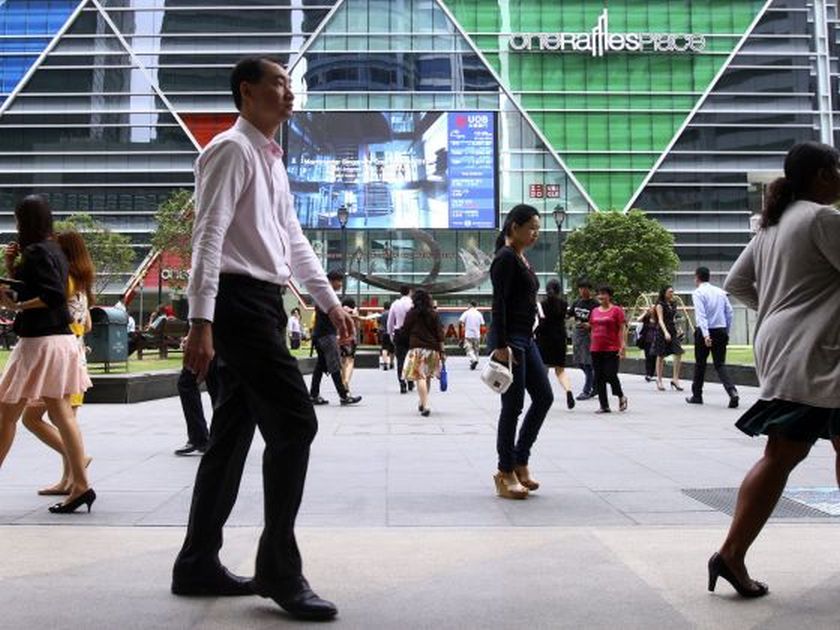 Office workers seen at Raffles Place. u00e2u20acu2022 Picture by Ernest Chua/Today