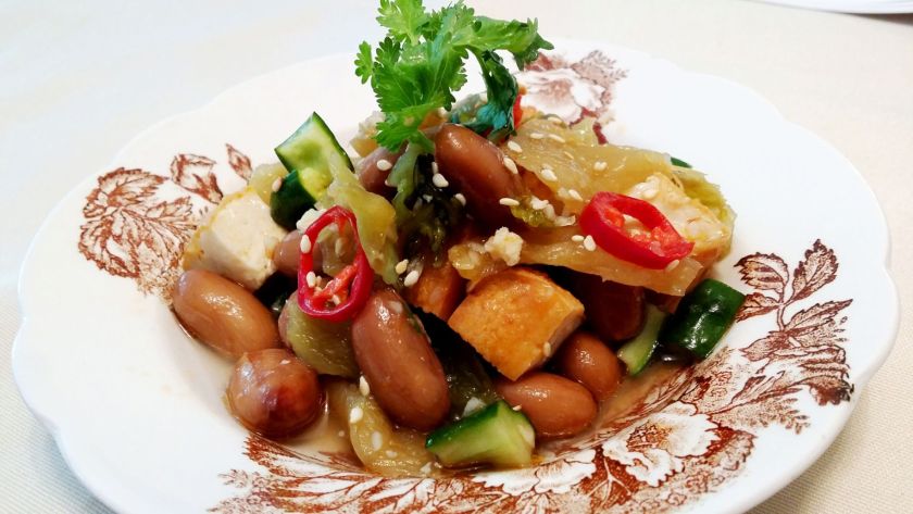 Chef Eric Low's tau kua (compressed beancurd) and gong chye salad updates a classic dish while preserving traditional flavours. u00e2u20acu201d TODAY picnn