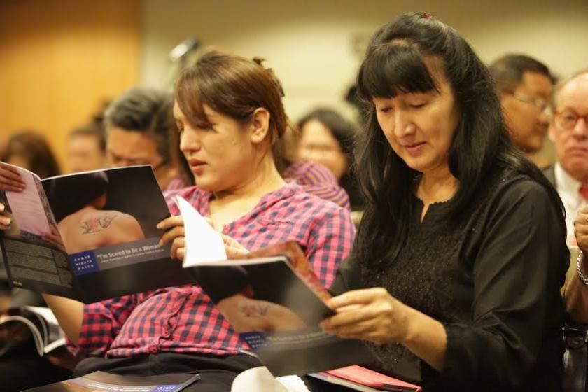 Participants reading the 'Iu00e2u20acu2122m Scared to Be a Woman' report. u00e2u20acu201d Picture by Choo Choy May