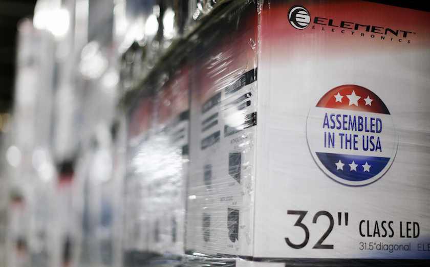 An u00e2u20acu02dcAssembled in the USAu00e2u20acu2122 stamp is seen at the side of a box containing a 32-inch television set in the warehouse of Element Electronics, in Winnsboro, South Carolina in this file photo taken May 29, 2014. u00e2u20acu201c Reuters pic