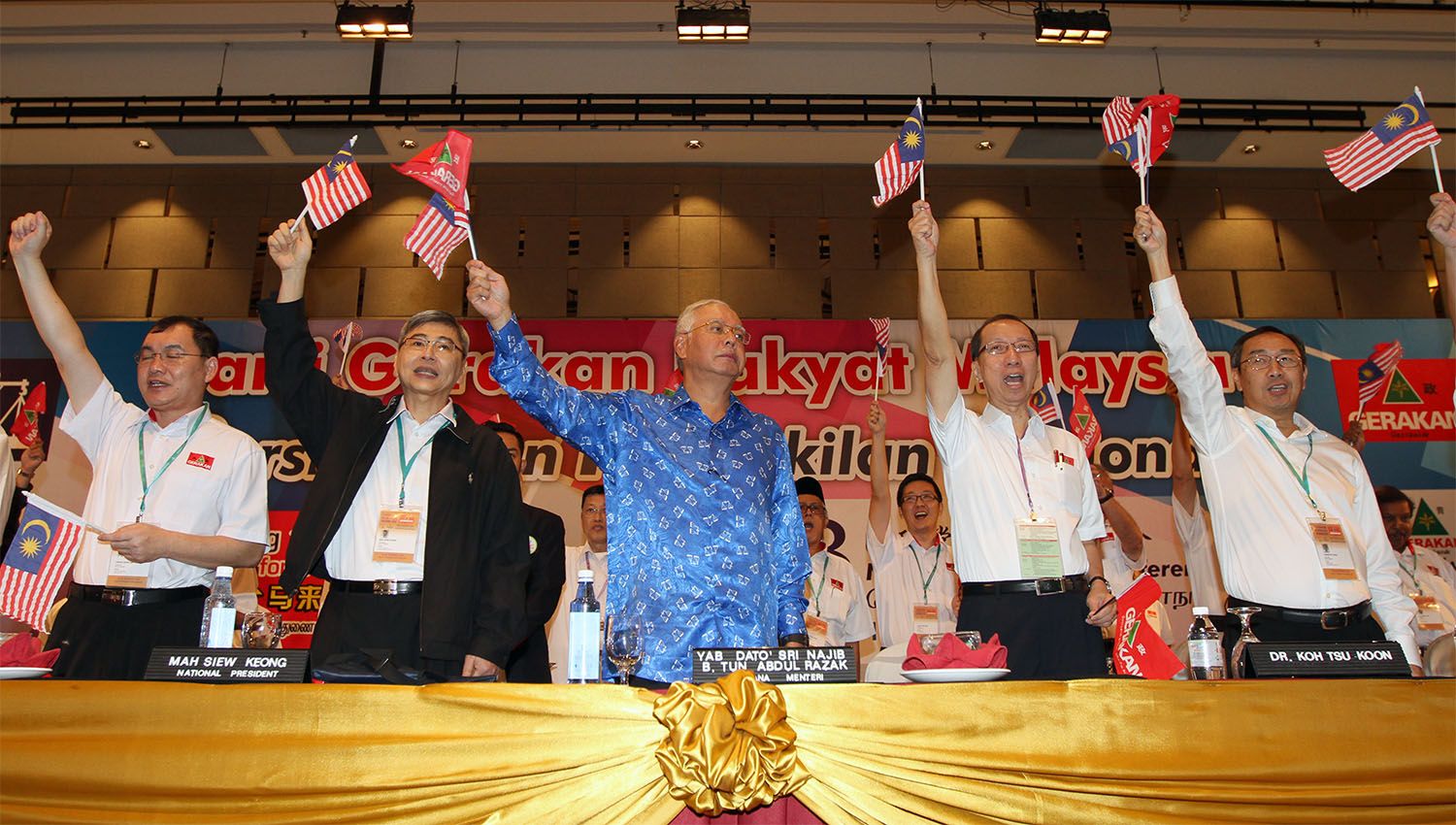 Datuk Seri Najib Razak (centre), Gerakan President, Datuk Mah Siew Keong and (second left), and Dr Koh Tsu Koon (second right) attend Gerakanu00e2u20acu2122s  43rd National Delegates Conference in Setia City Convention Centre, Shah Alam, October 19, 2014. u00e2u20acu201d Picture