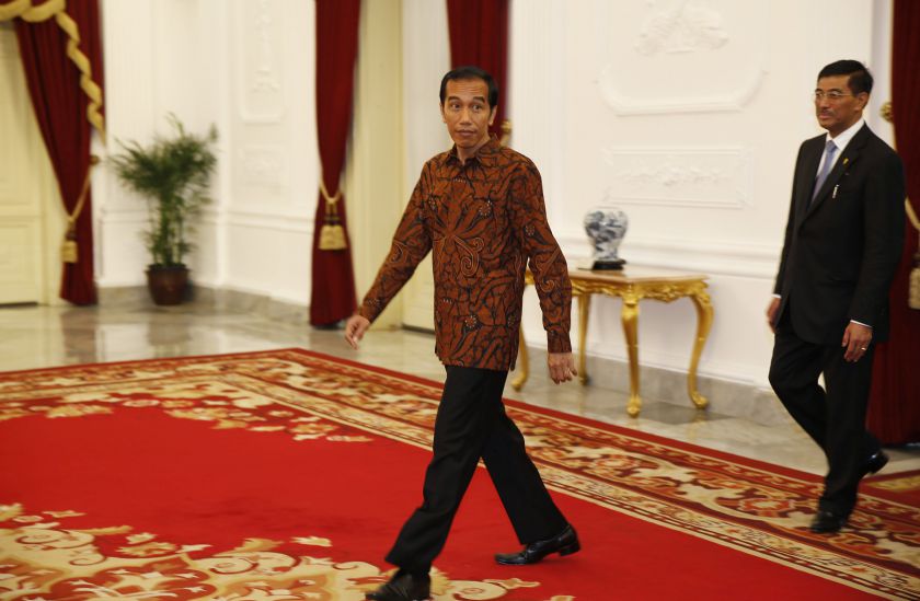 Indonesiau00e2u20acu2122s new President Joko Widodo is pictured as he walks at the presidential palace in Jakarta, October 20, 2014. u00e2u20acu201d Reuters
