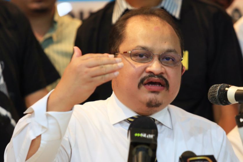 PKR Vice-president Shamsul Iskandar Mohd Akin speaking to reporters during the launching of #Justice4AnwarIbrahim at the  PKR headquarters, October 27, 2014. u00e2u20acu201d Picture by Saw Siow Feng