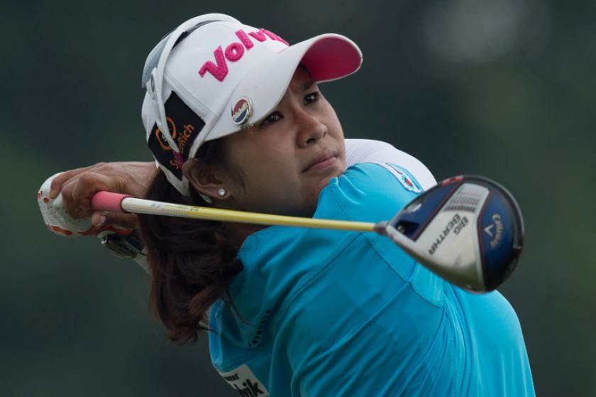 Pornanong Phatlum of Thailand tees off for the 18th hole during the third round of the Sime Darby LPGA Malaysia 2014 at the Kuala Lumpur Golf and Country Club, October 11, 2014. u00e2u20acu201d AFP pic