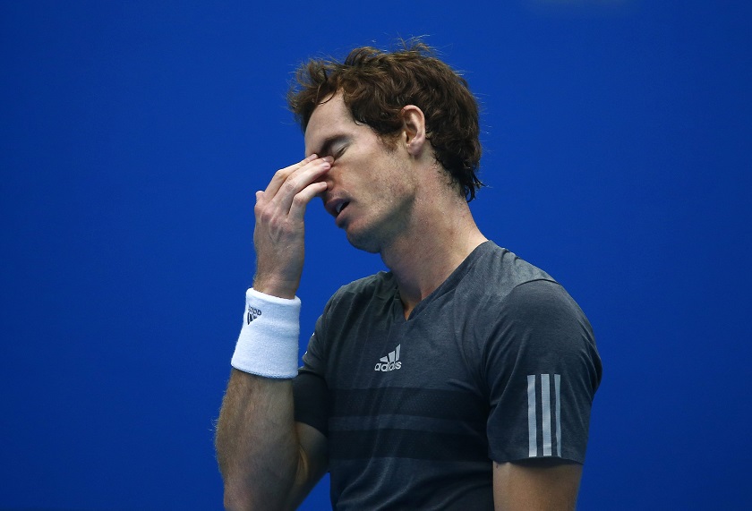 Andy Murray of Britain reacts after missing a shot during the menu00e2u20acu2122s singles semi-final match against Novak Djokovic of Serbia at the China Open tennis tournament in Beijing, October 4, 2014. u00e2u20acu201d Reuters pic