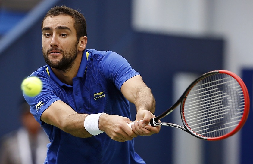 Marin Cilic returns a shot during his menu00e2u20acu2122s singles tennis match against Ivo Karlovic of Croatia at the Shanghai Masters tennis tournament in Shanghai, October 7, 2014. u00e2u20acu201d Reuters pic