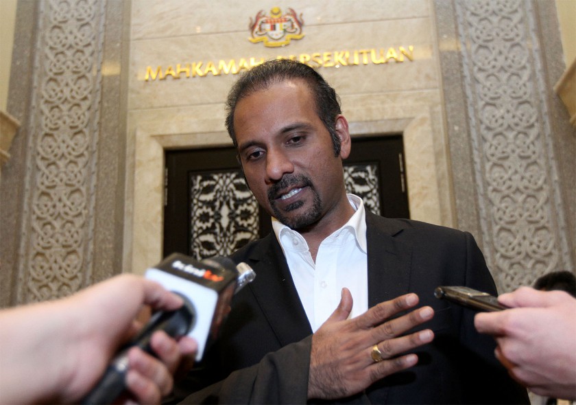 Datuk Seri Anwar Ibrahimu00e2u20acu2122s counsel Ramkarpal Singh answers reportersu00e2u20acu2122 questions after coming out of the Federal Court at the Palace of Justice, Putrajaya, October 29, 2014. u00e2u20acu201d Picture by Yusof Mat Isa