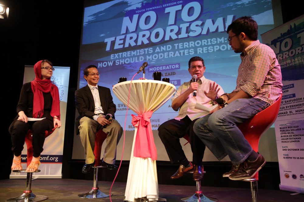 The three panellists and moderator, Ezra Zaid (right), at the youth townhall session themed u00e2u20acu02dcExtremists & Terrorism: How Should Moderates Respond?u00e2u20acu2122, at Publika Solaris Dutamas, October 2, 2014. u00e2u20acu201d Picture by Choo Choy May 