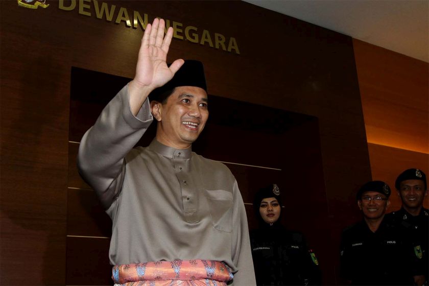 Selangor Mentri Besar Azmin Ali waves as he leaves after the tabling of Budget 2015 in Parliament, October 10, 204. u00e2u20acu201d Picture by Yusof Mat Isa