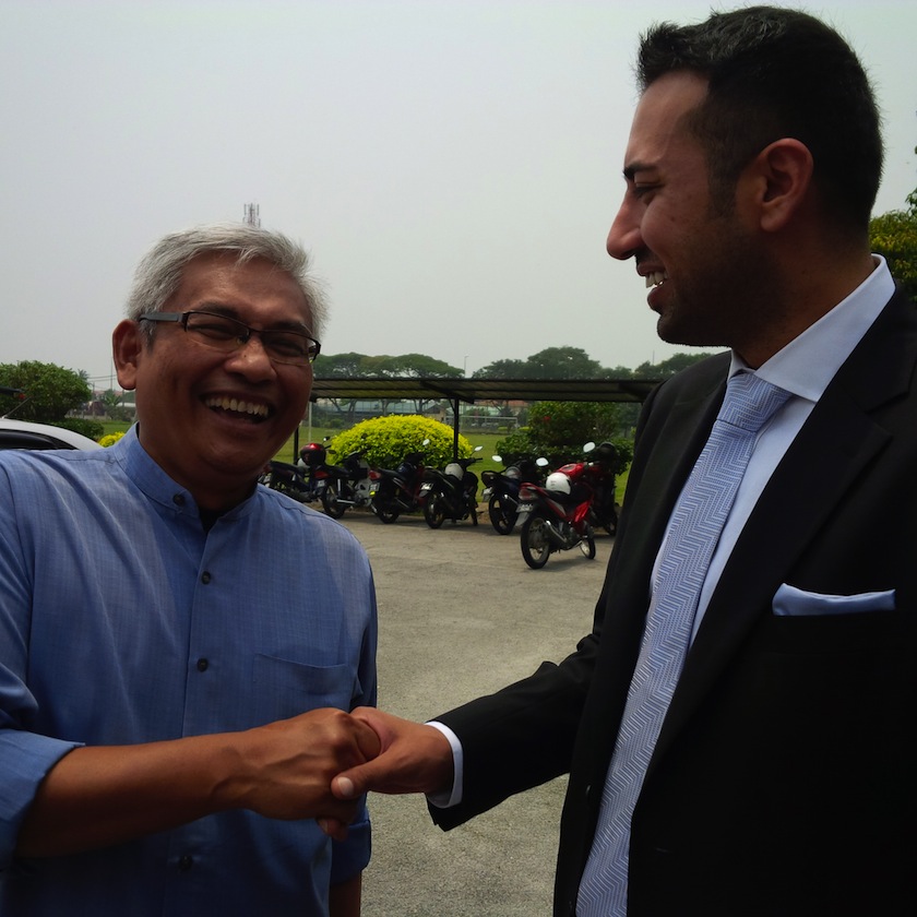 Aziz and his lawyer Dr Dheeraj Bhar. u00e2u20acu201d Picture by Yiswaree Palansamy