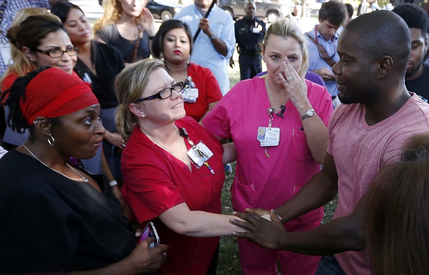 Josephus Weeks (right), nephew of Thomas Eric Duncan, the first patient diagnosed with Ebola on US soil, thanks supporters at a prayer vigil for his uncle in Dallas, Texas October 7, 2014. u00e2u20acu201d Reuters pic