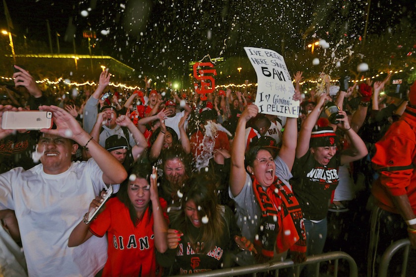 Fans celebrate after the San Francisco Giants defeated the Kansas City Royals to win the World Series during a television viewing event at the Civic Centre in San Francisco, California October 29, 2014. u00e2u20acu201d Reuters pic