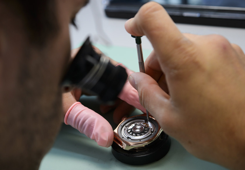 Swiss watchmaker Hublot employee works on a watch on October 23, 2012, in Paudex, western Switzerland. u00e2u20acu201d AFP picn